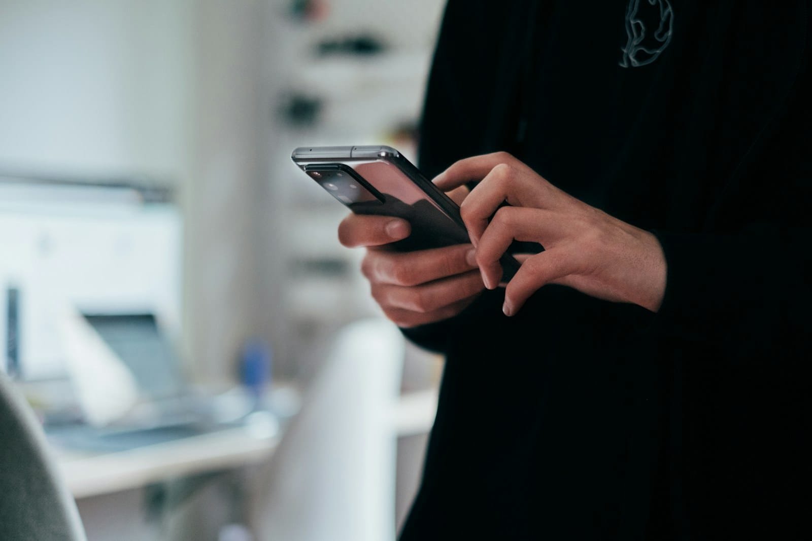 Person holding a Samsung smartphone